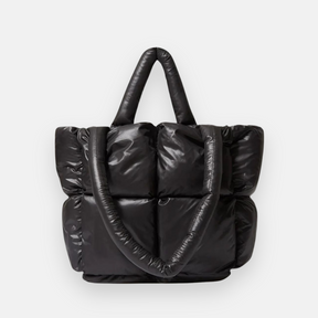 Imagem com fundo branco bolsa puffer preta